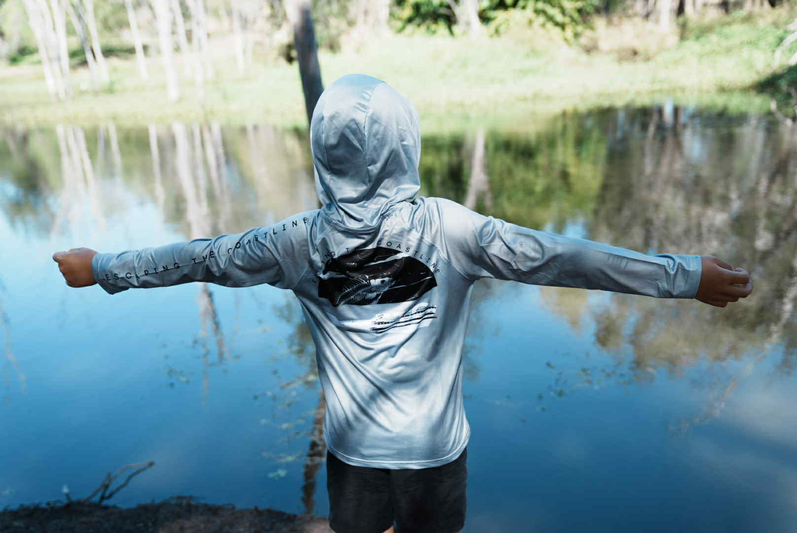 Kids performance long sleeve fishing shirt with water-resistant pockets and elastic hood, sun protection, no buff or thumb holes